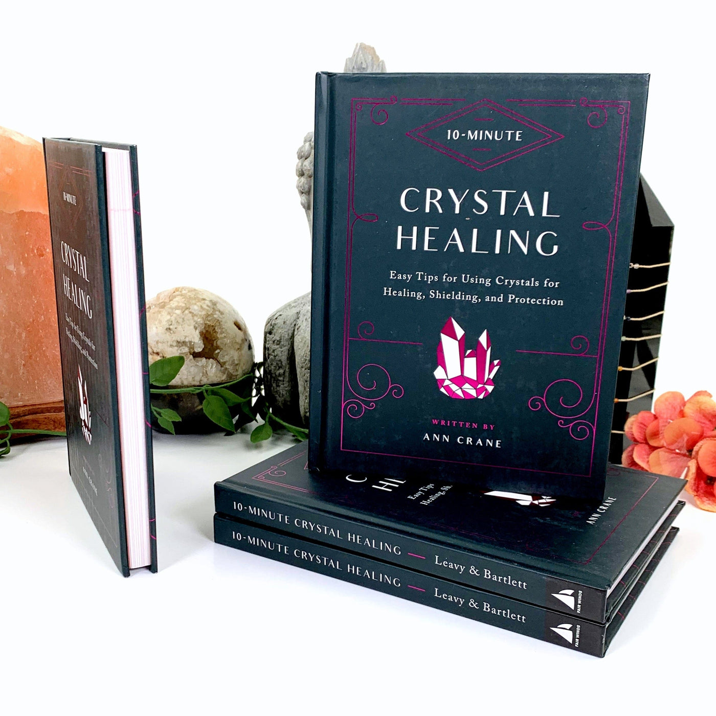 Four 10-Minute Crystal Healing by Ann Crane Books, one displaying the side view.