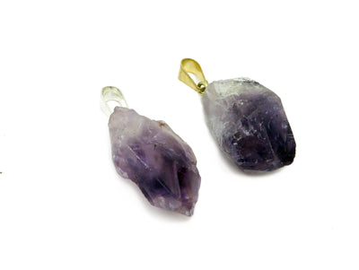 Petite Amethyst Quartz Point Pendant showing silver bail on the left and gold bail on the right