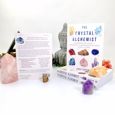 back view of the crystal alchemist books with a white background