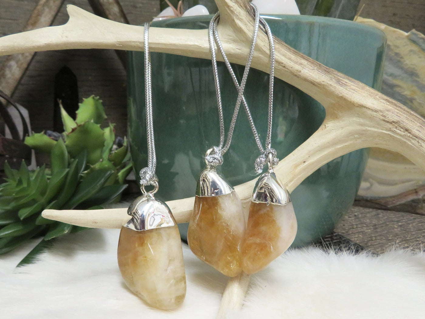 Citrine Polished Crystal Ornament in silver electroplated cap with silver string