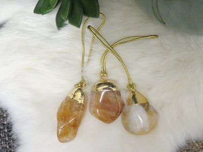 Citrine Polished Crystal Ornament displayed to show various color hues sizes and natural inclusions