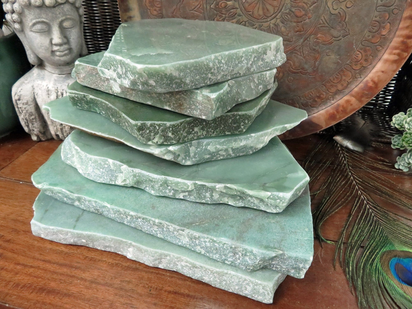7 green quartz platters stacked up