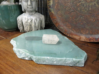 green quartz platter on a table with a spreader on it