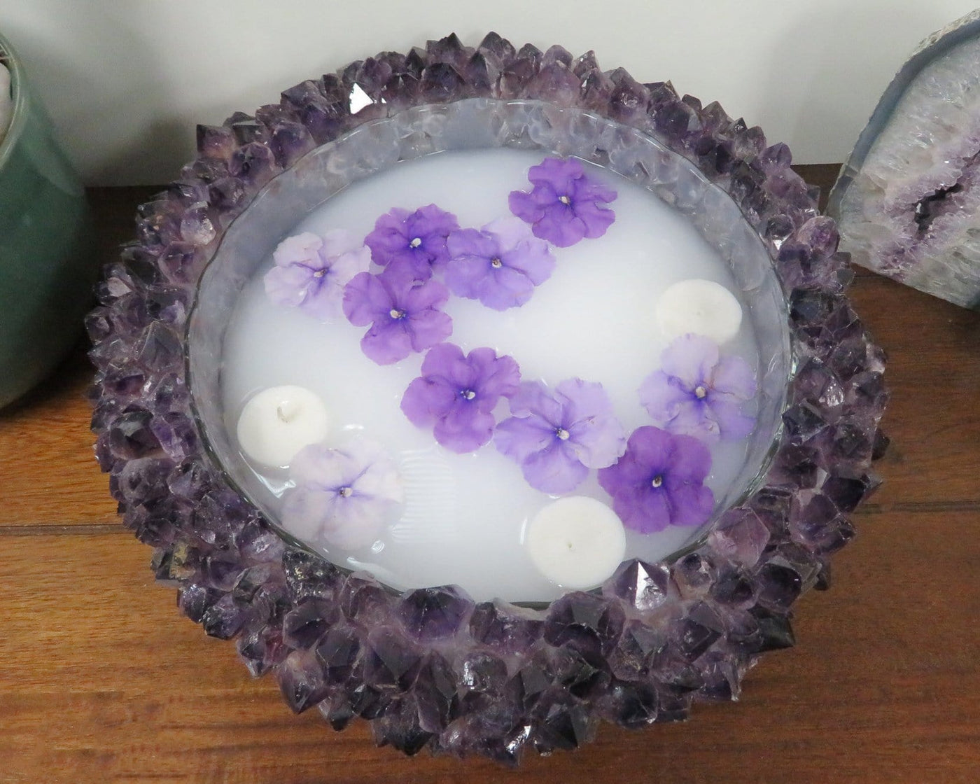 amethyst point bowl with flowers and candles floating