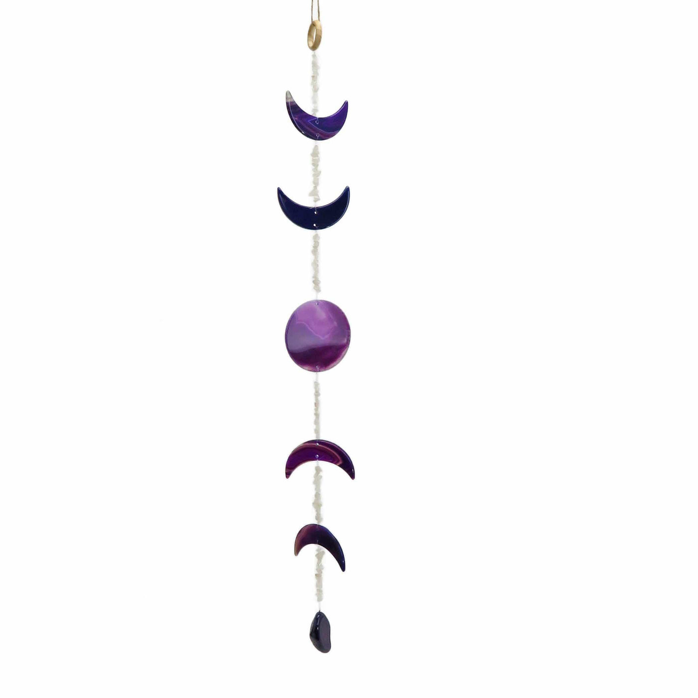One purple agate moon phase wall hanging hung with a white background.