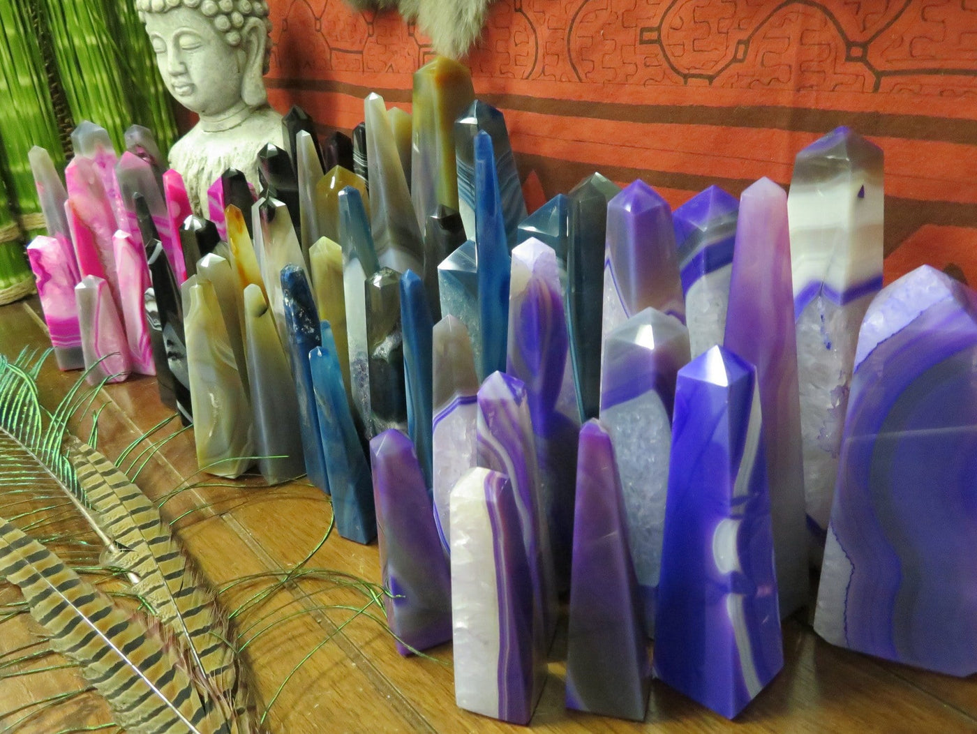 side view Picture of all of all the variety of colors we have available for our agate tower points.