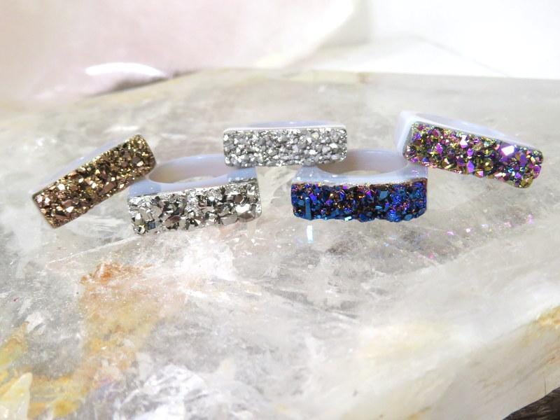 rings displayed to show different textures from the druzy