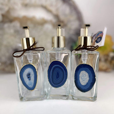 Picture of three of our blue agate soap dispensers.