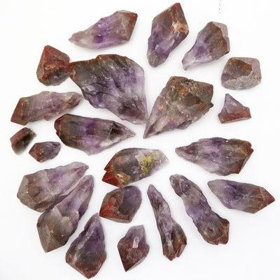 many seven minerals in one stone rough points on display for possible variations