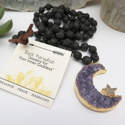 side view of Amethyst Druzy Crescent Moon on Lava Stone Mala Necklace for thickness reference