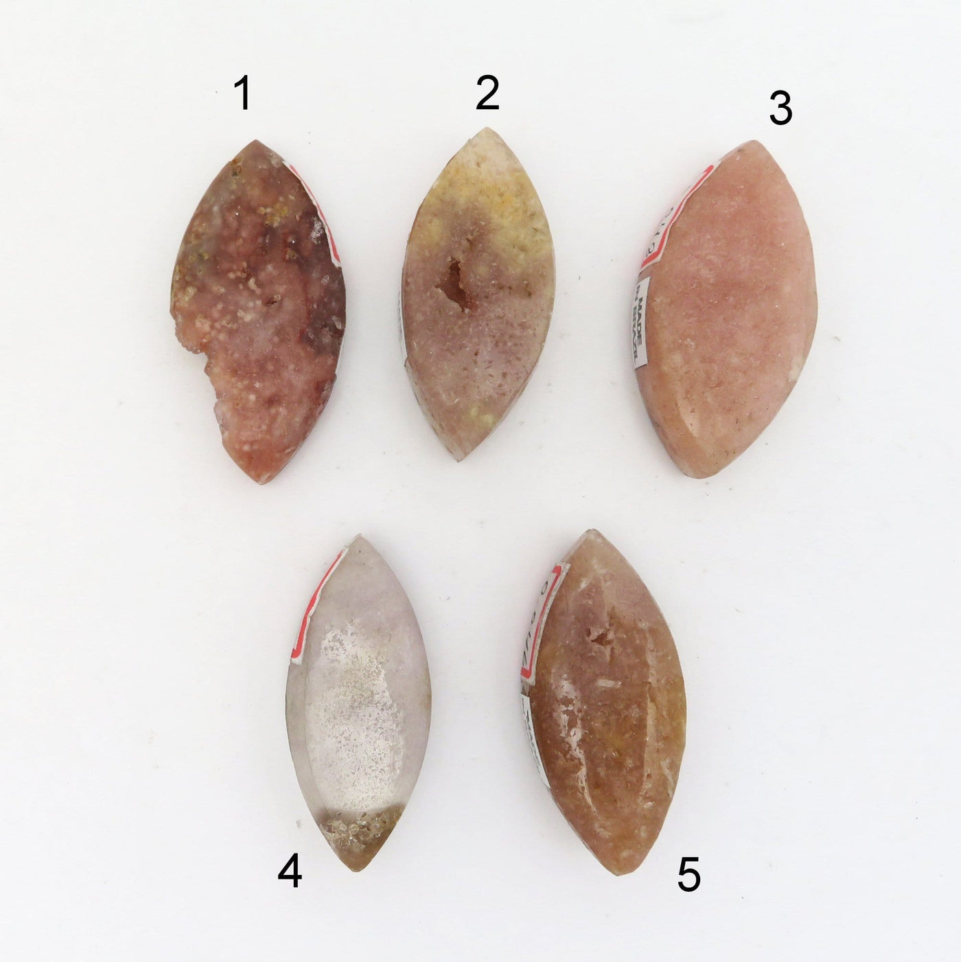 5 different Pink Amethyst Polished Marquise Stone Shapes on white background