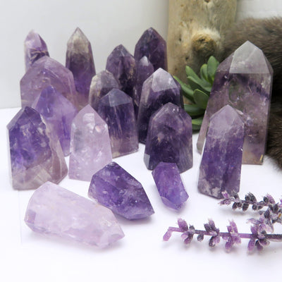 amethyst displayed standing on base on white background