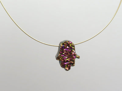 head drilled hamsa bead titanium druzy pictured with wire to show as a necklace 