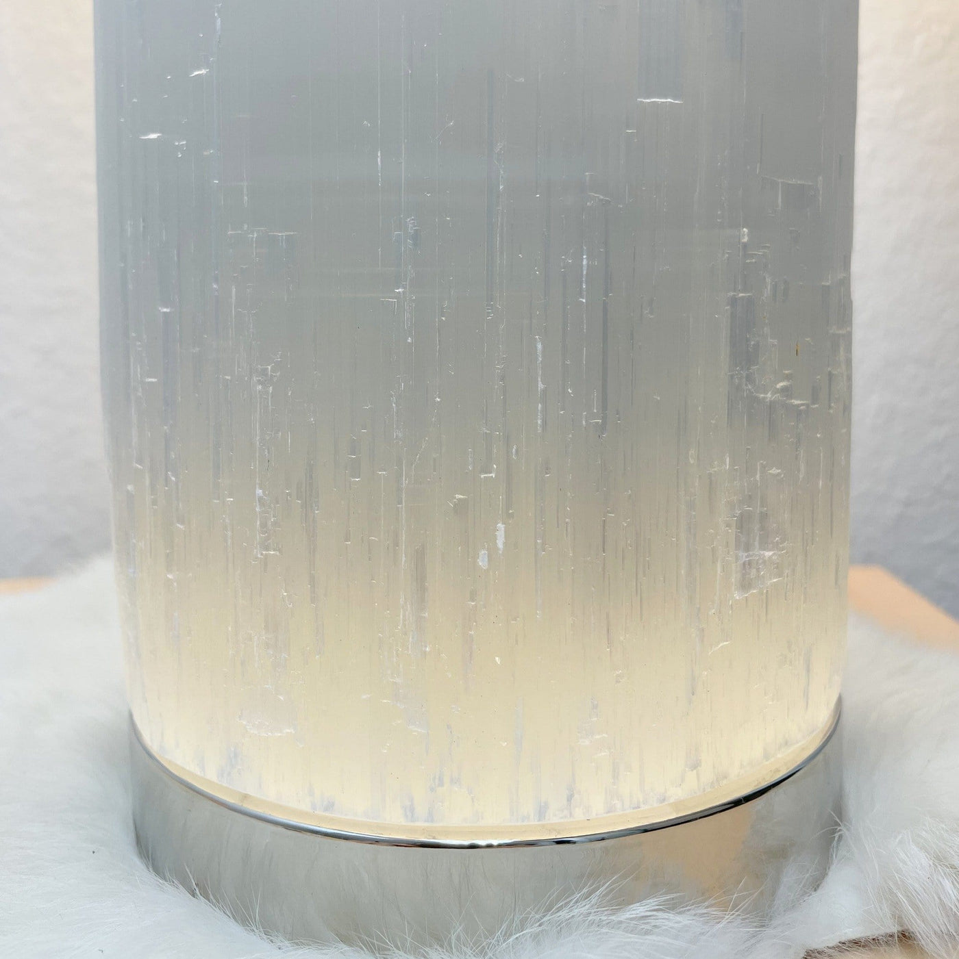 close up of selenite lamp silver base