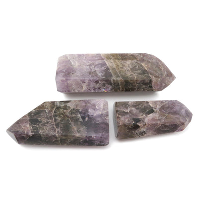 three seven minerals in one cut base points laying flat 