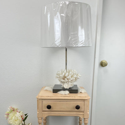 White Coral Base Lamp on nightstand with decorations