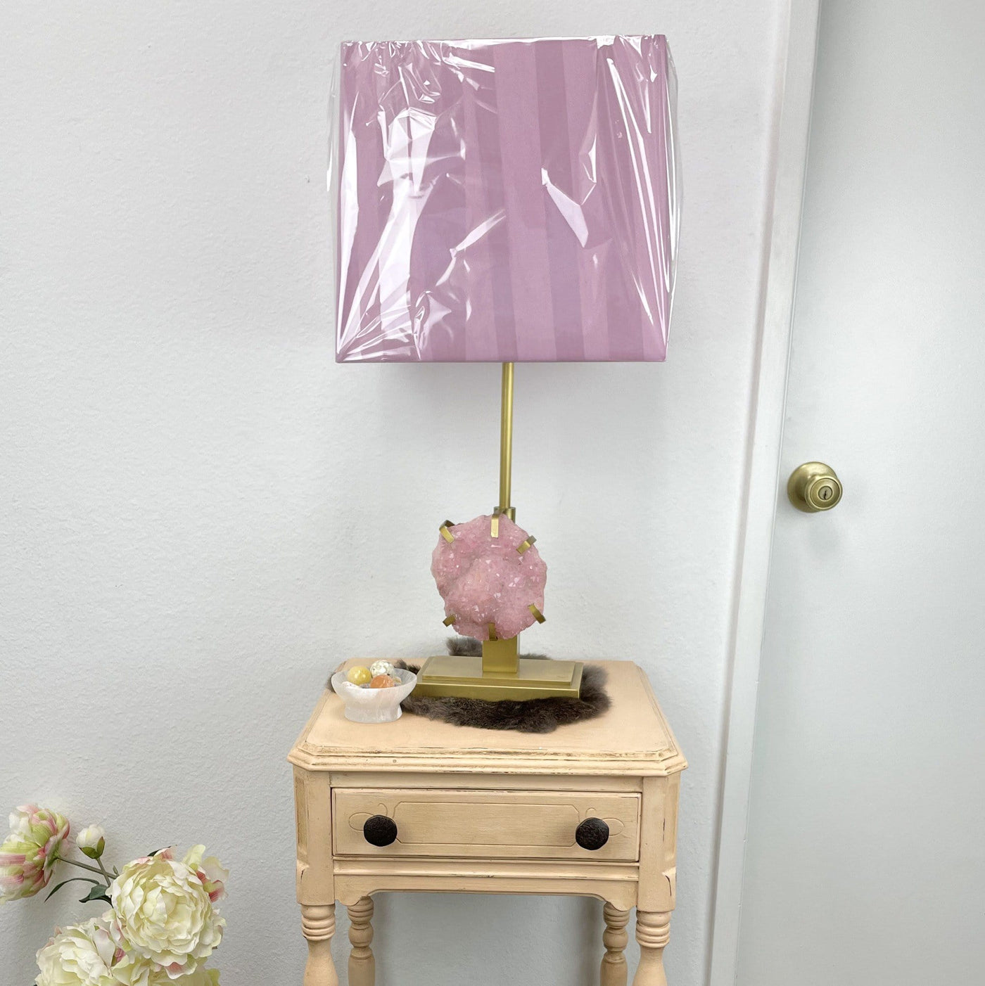 Pink Crystal Druzy Lamp on nightstand with decorations