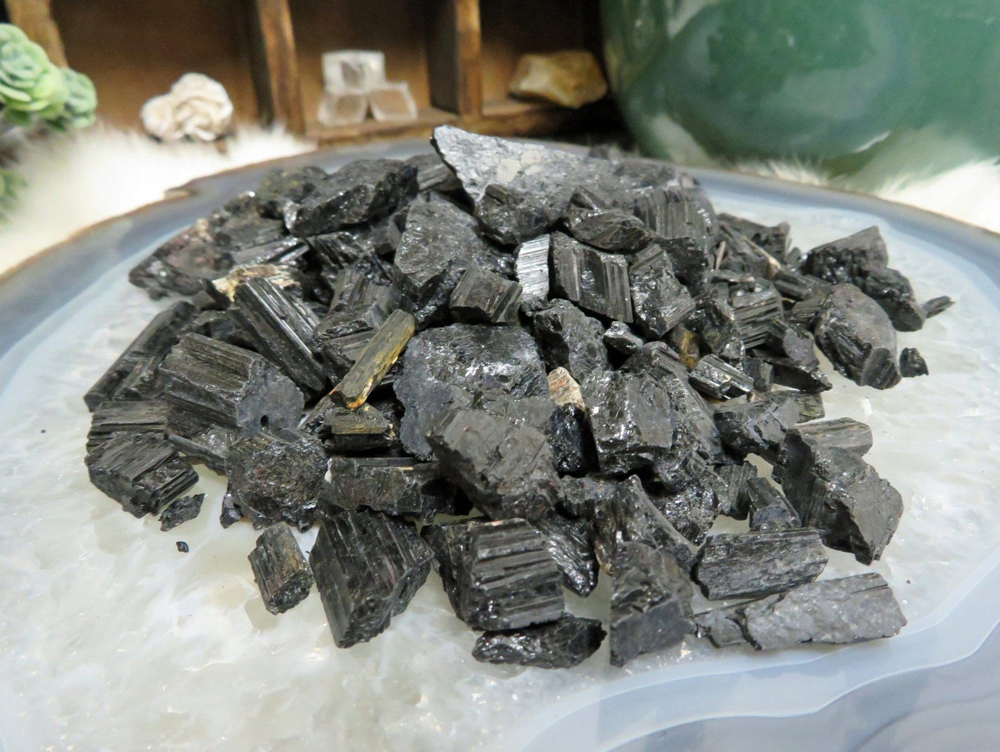 a pile of tourmaline chips displayed to show different textures and thickness reference