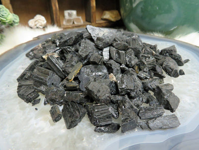 a pile of tourmaline chips displayed to show different textures and thickness reference