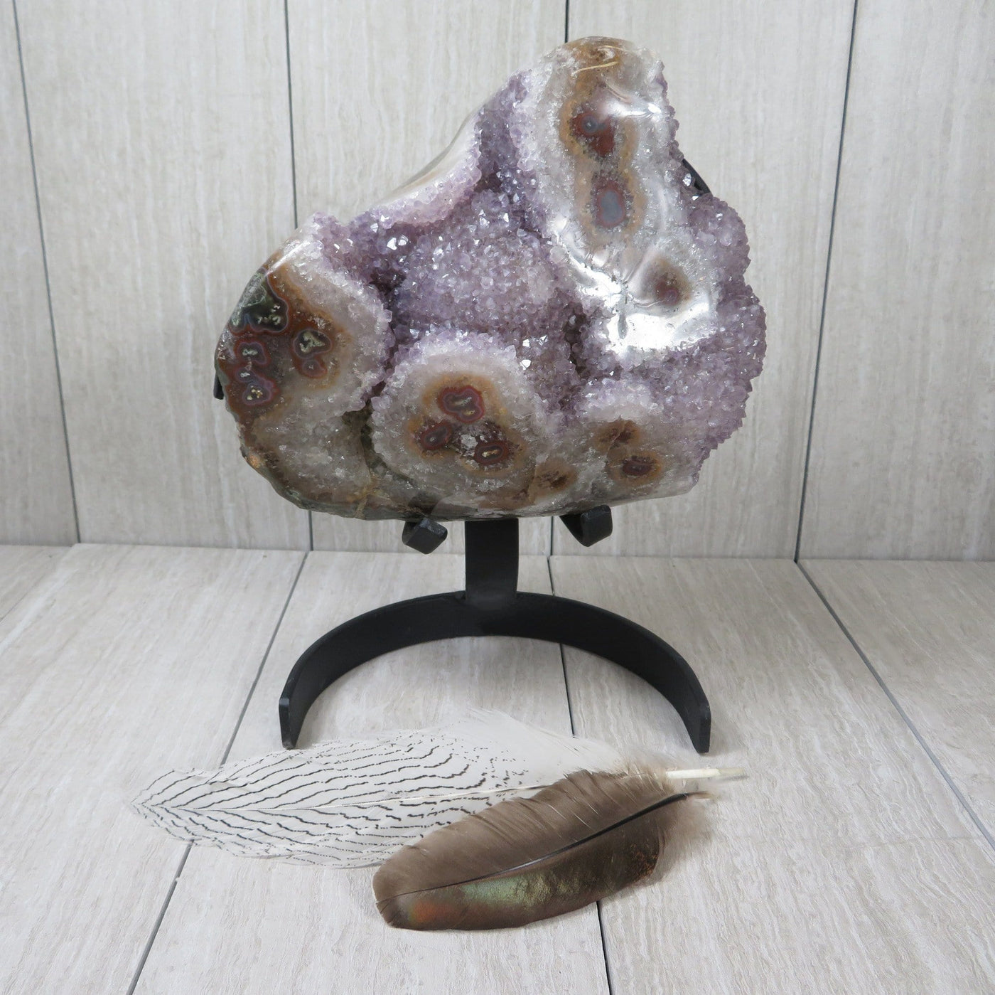 amethyst formation with stalactites on metal stand
