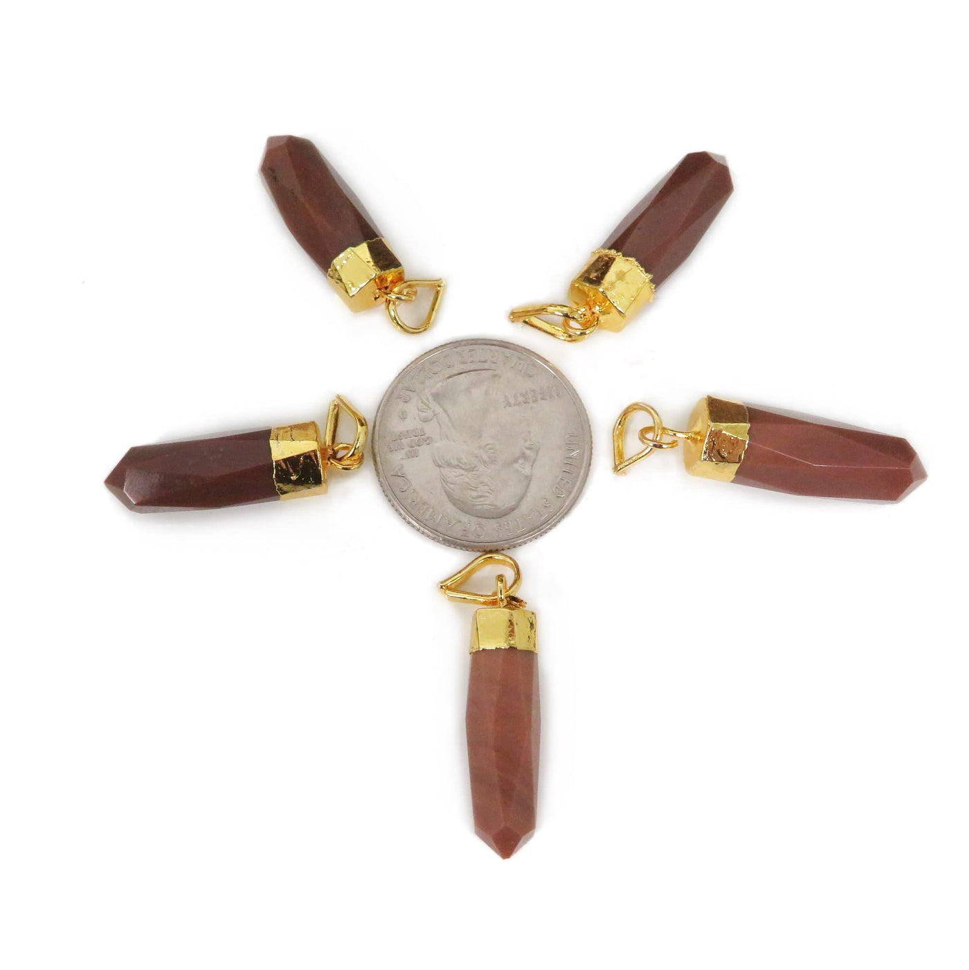 Jasper Spike Pendants with gold electroplated cap around a quarter to show size