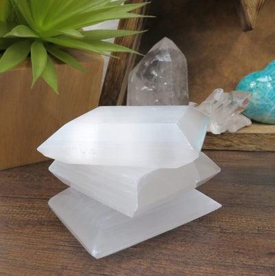 three selenite square charging plates stacked for thickness