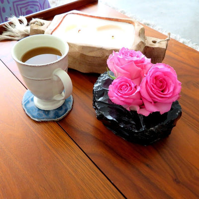 Black Obsidian Planter with flowers on a table display