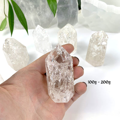 1 crackle quartz in a hand