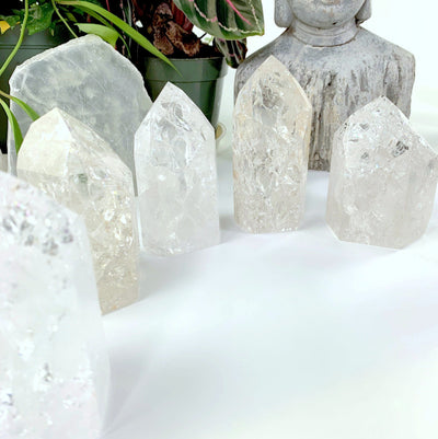 crackle quartz points standing up on a table