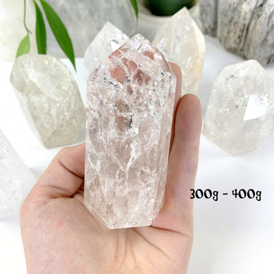 large crackle quartz in a hand