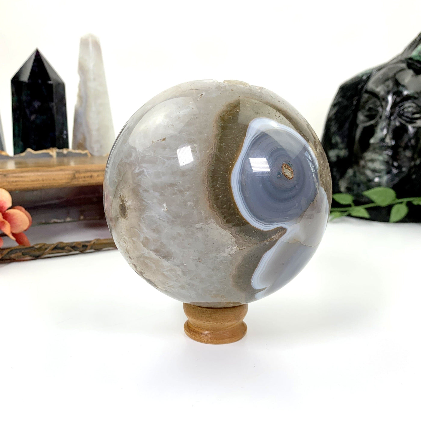 Natural Agate Druzy Sphere on a wooden round stand