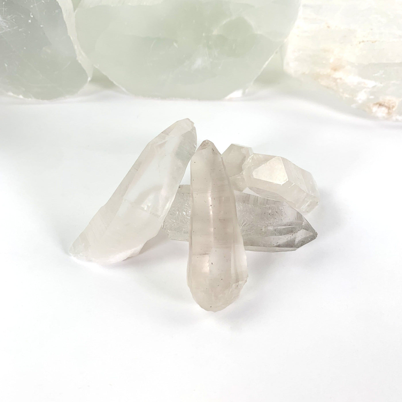 side view of Natural Lemurian Quartz Points for thickness reference