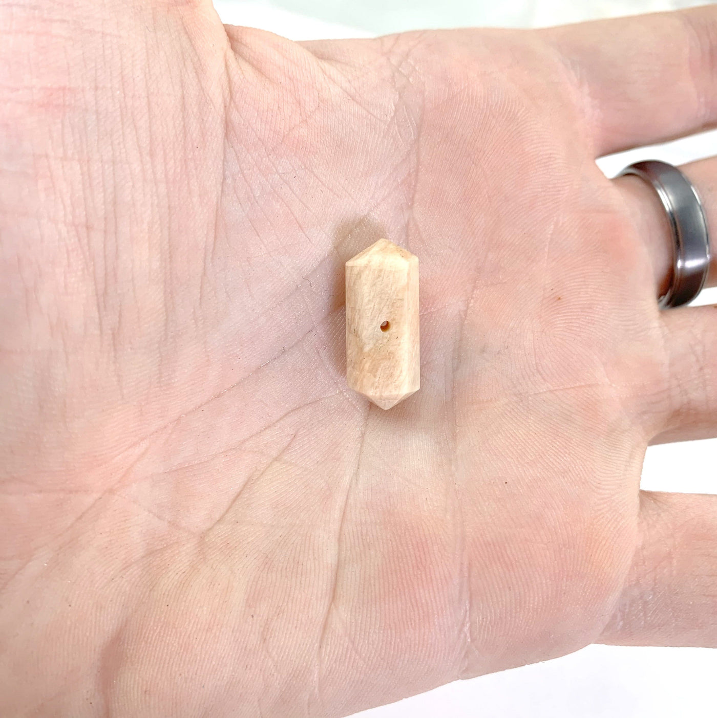Sunstone Pencil Point in the palm of a hand