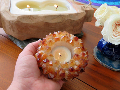 Citrine Point Candle Holder - in a hand