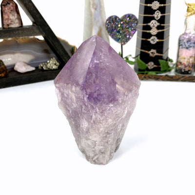 other angle of amethyst point on white background