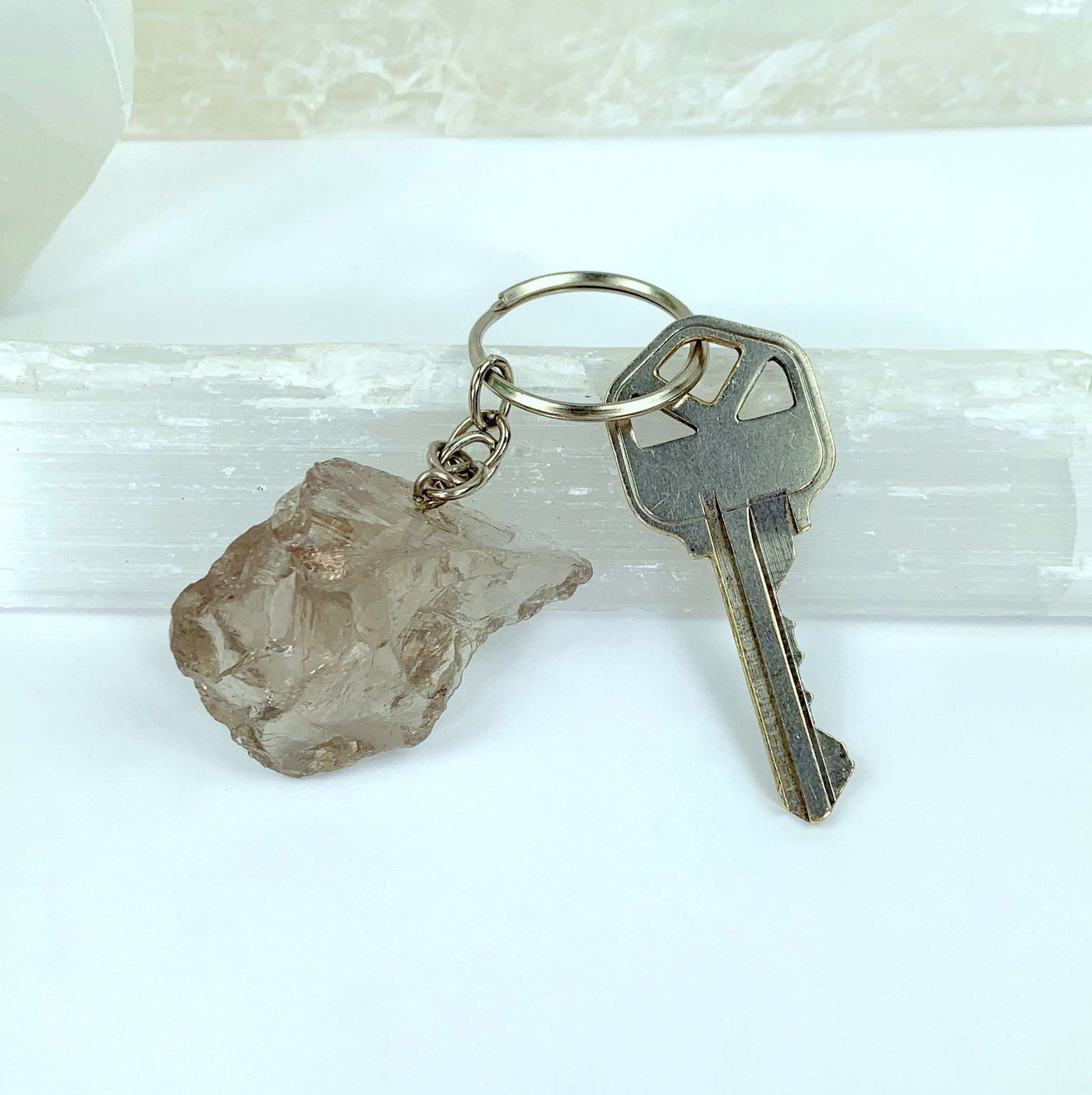 Natural Smoky Quartz Keychains - one with a key on it