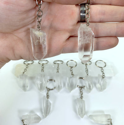 Natural Lemurian Point Keychains - 2 held in a hand