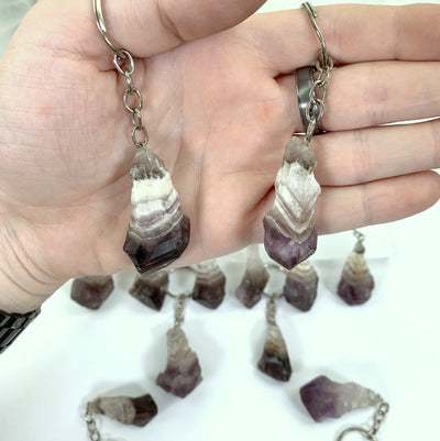 Natural Chevron Amethyst Keychains - 2 in a hand