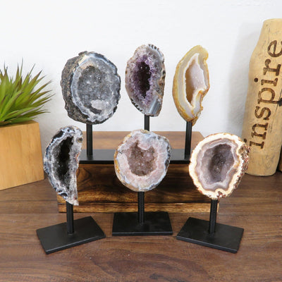 6 geode home decor stands with decorations