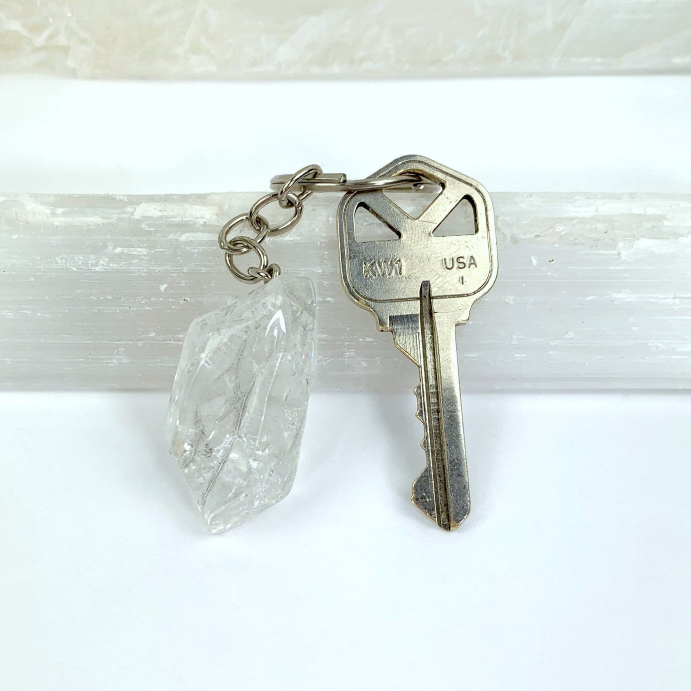 Crackle Quartz Keychain shown with a key