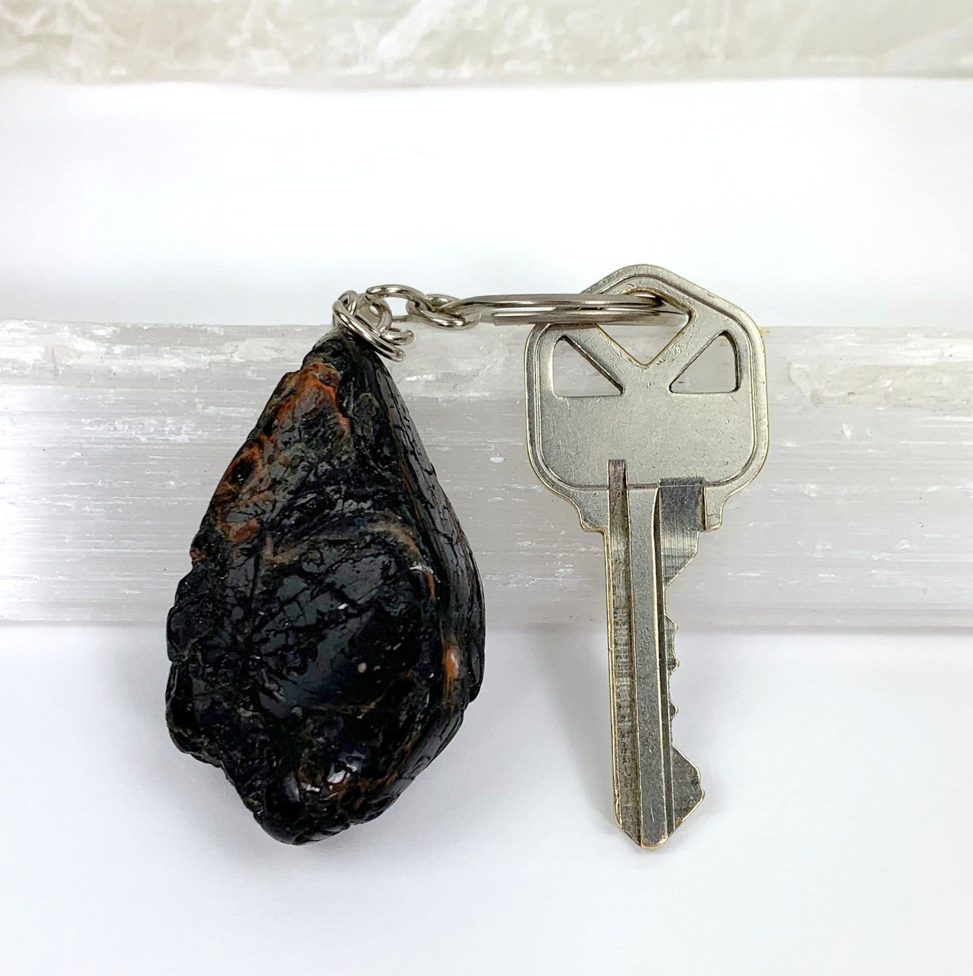 toourmaline with hematite keychain with a key