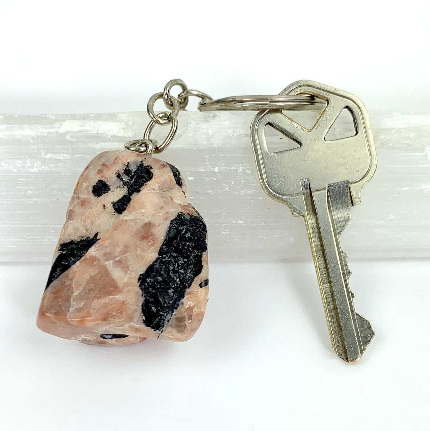  Polished Tourmaline with Feldspar keychain on silver link and hoop attached to key for size reference