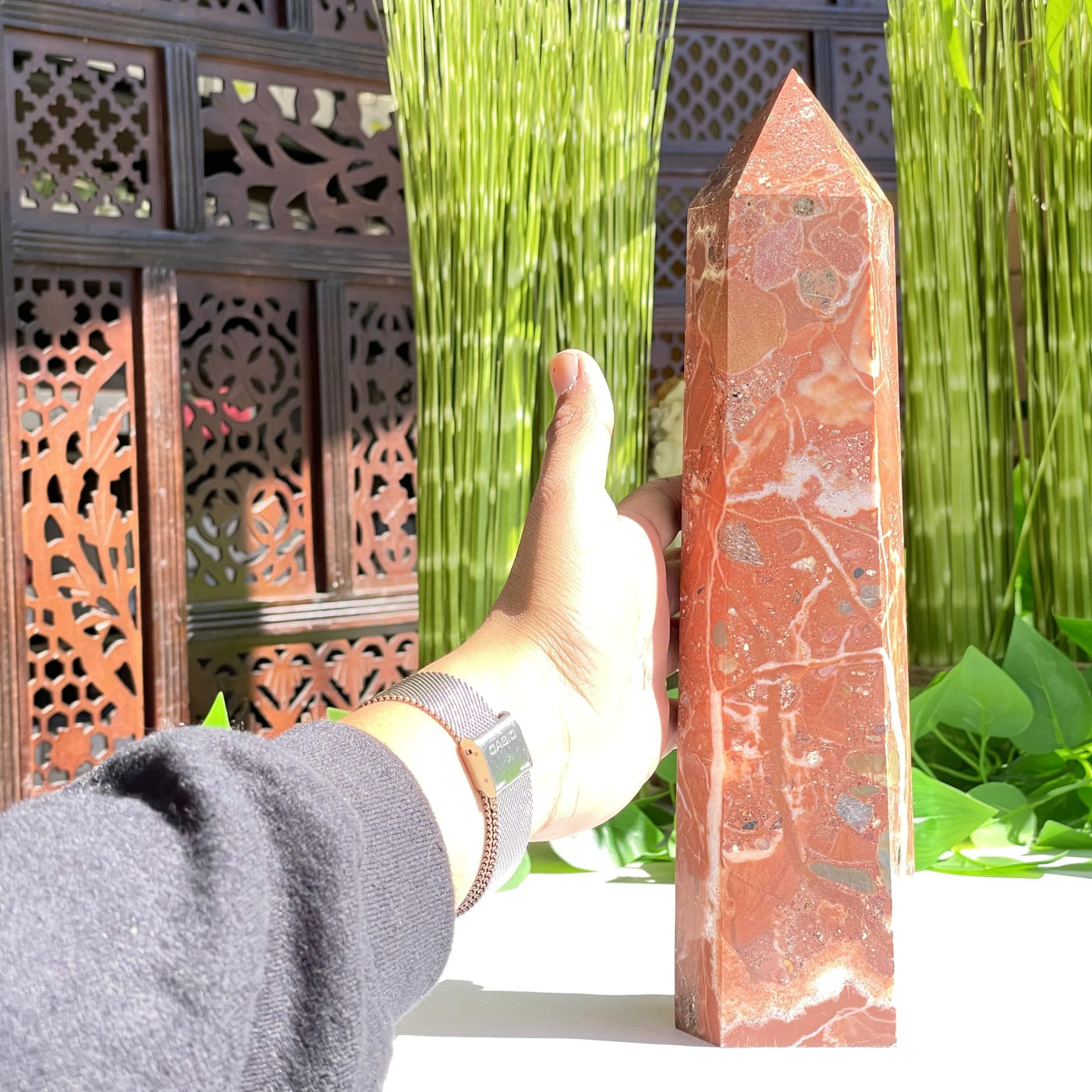 A handing comparing its size to the tall red Jasper Tower