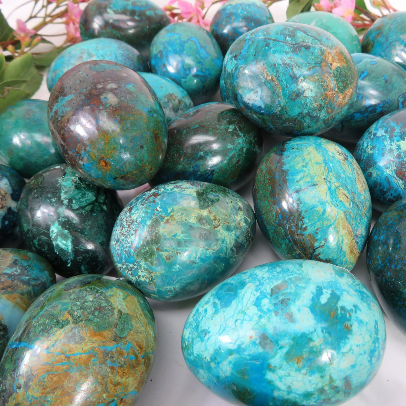 A Close up of the Chrysocolla Polished Stone Eggs to show the differences in size, shape and color. 