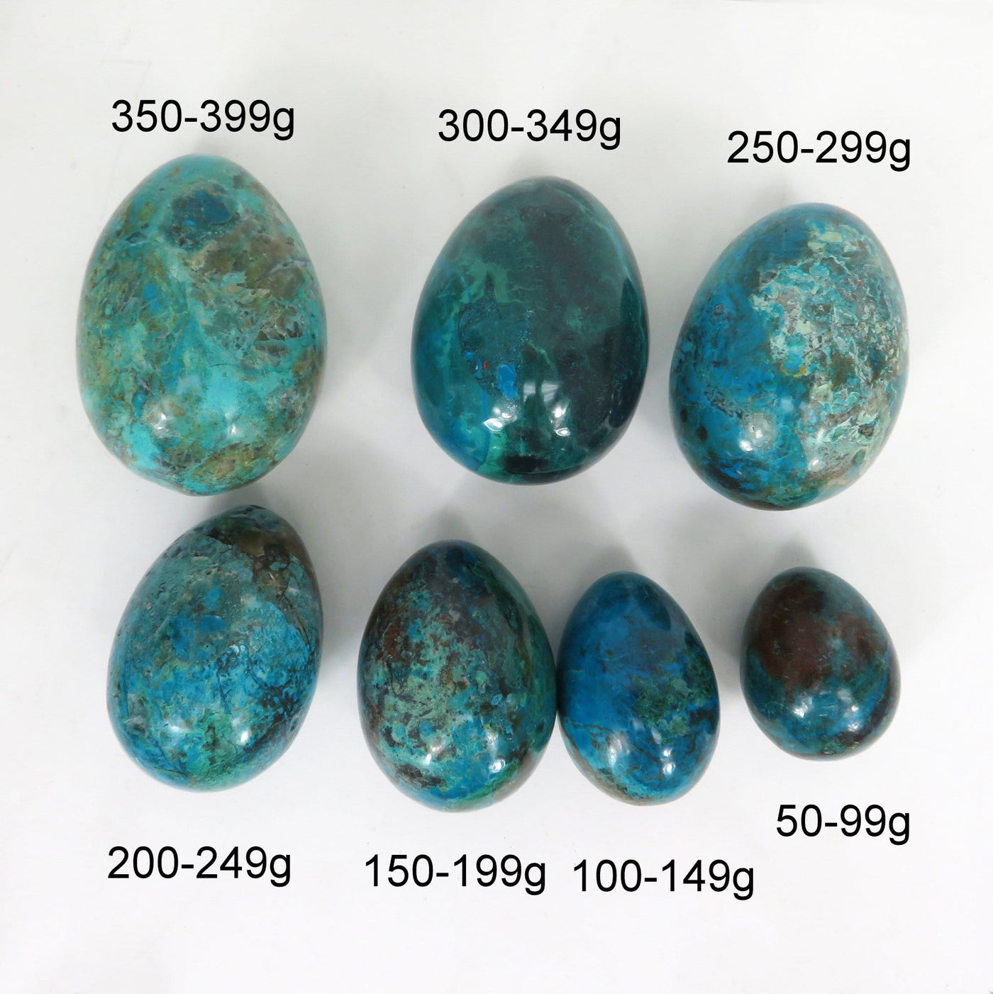 7 sizes of the Chrysocolla Polished Stone Eggs to show the differences in size. From 50g to 399g 
