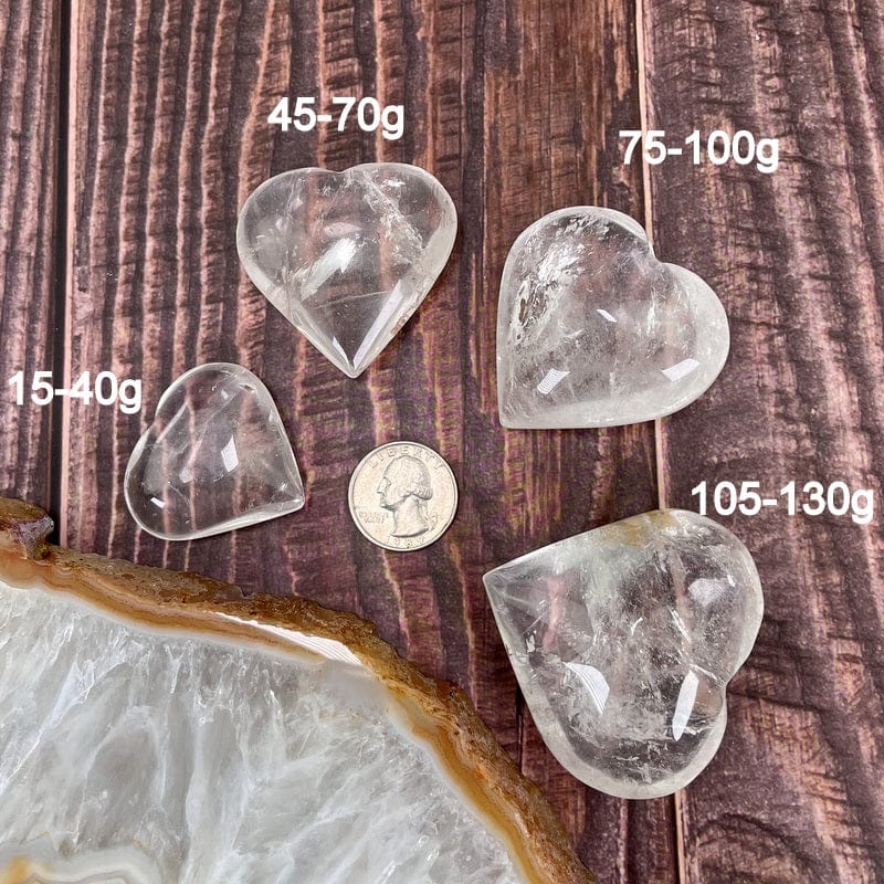 crystal quartz hearts next to the size in grams 