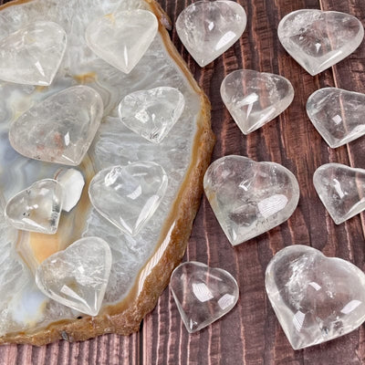 multiple crystal quartz hearts displaying different sizes 
