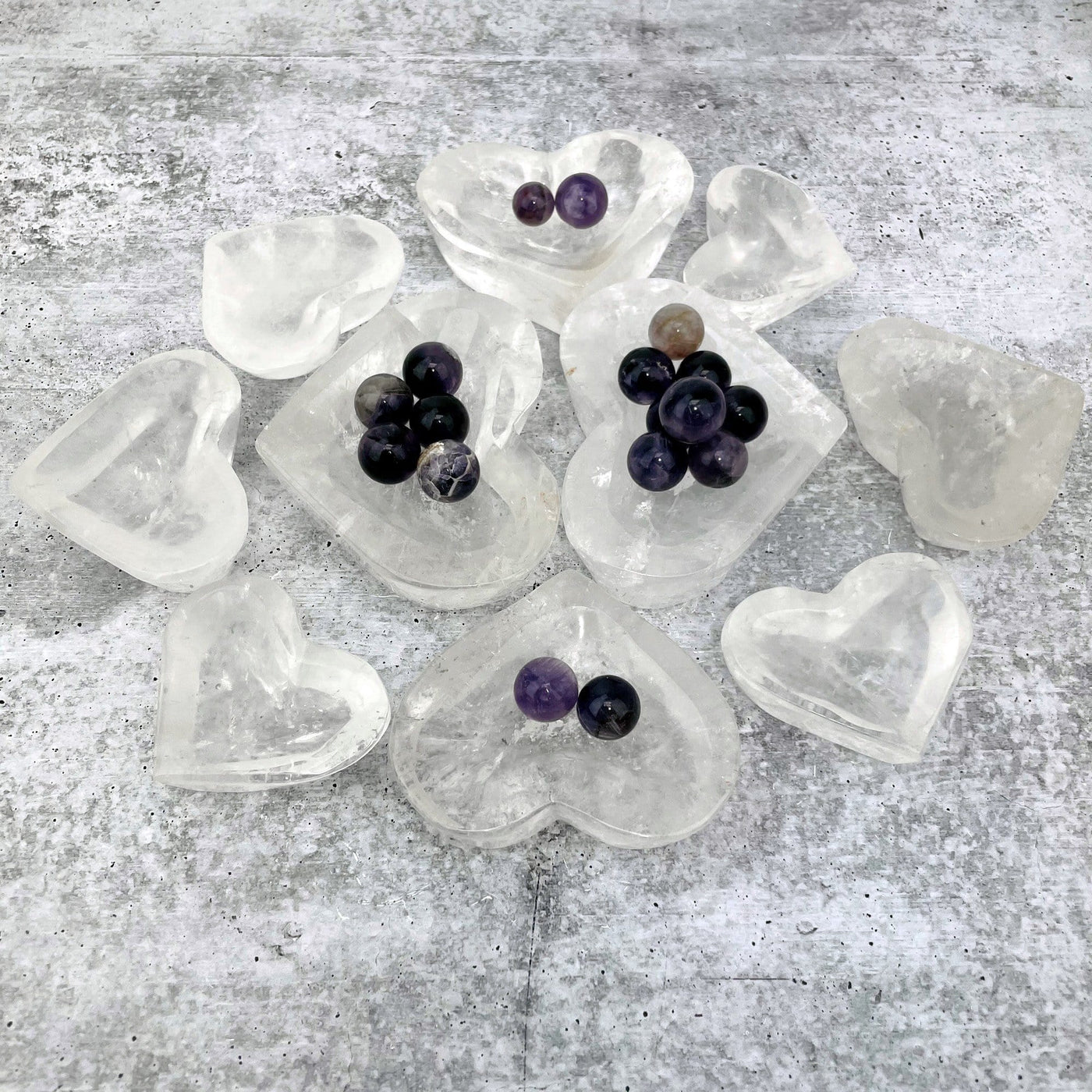 Crystal Quartz Heart Bowls displayed in a circle