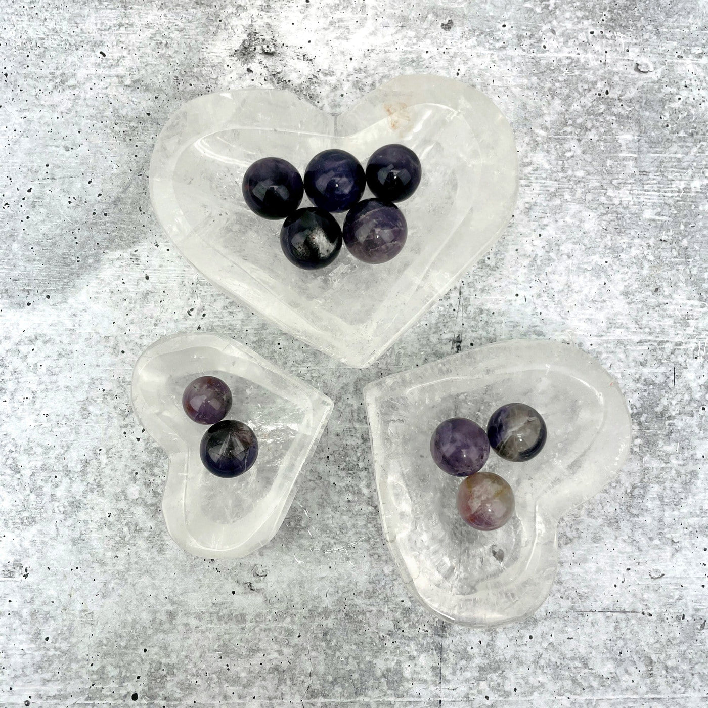 3 sizes of the crystal quartz heart bowls with spheres 