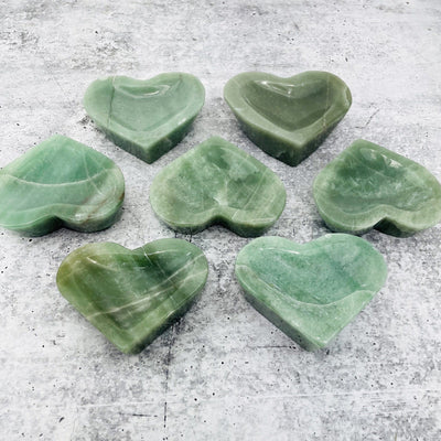 multiple Green Aventurine Stone Heart Dishes showing various shades of green patterns and natural inclusions